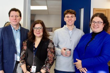 Dean Gary Leising with members of the Center for Faculty Excellence at the Center's January 17, 2024 opening.