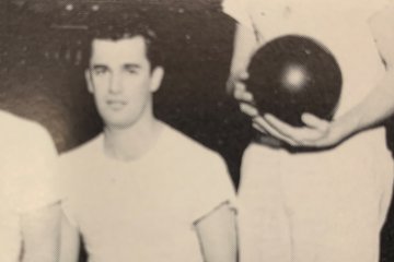 Yearbook photo of Frank Tomaino in white t-shirt on Utica bowling team, 1959.