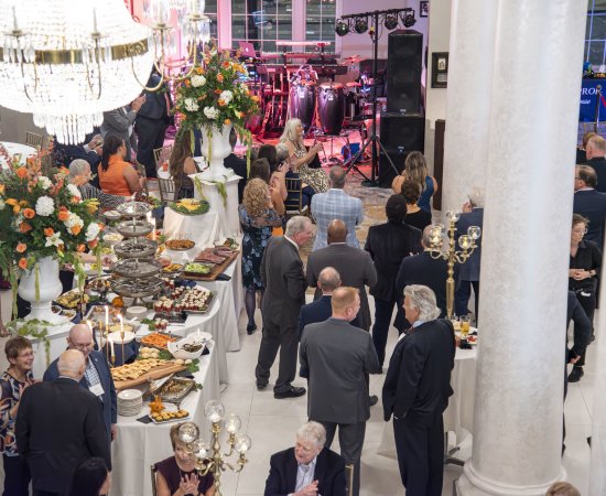 Attendees mingle at the Community Dinner.